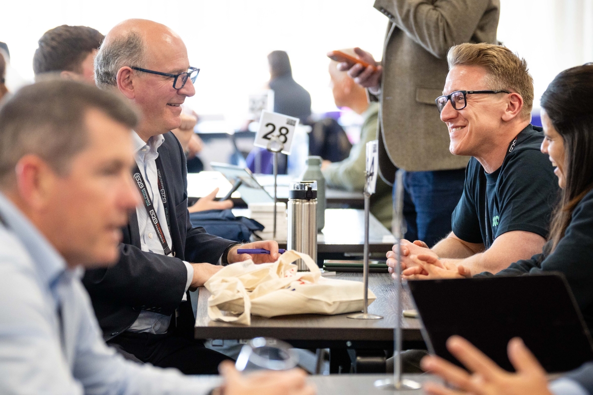 B2B eCommerce professionals meeting and networking at an industry event
